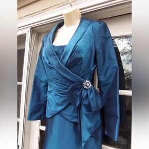 RINA DI MONTELLA dress and jacket. Jovani, Sherri Hill, Mac Duggal style.